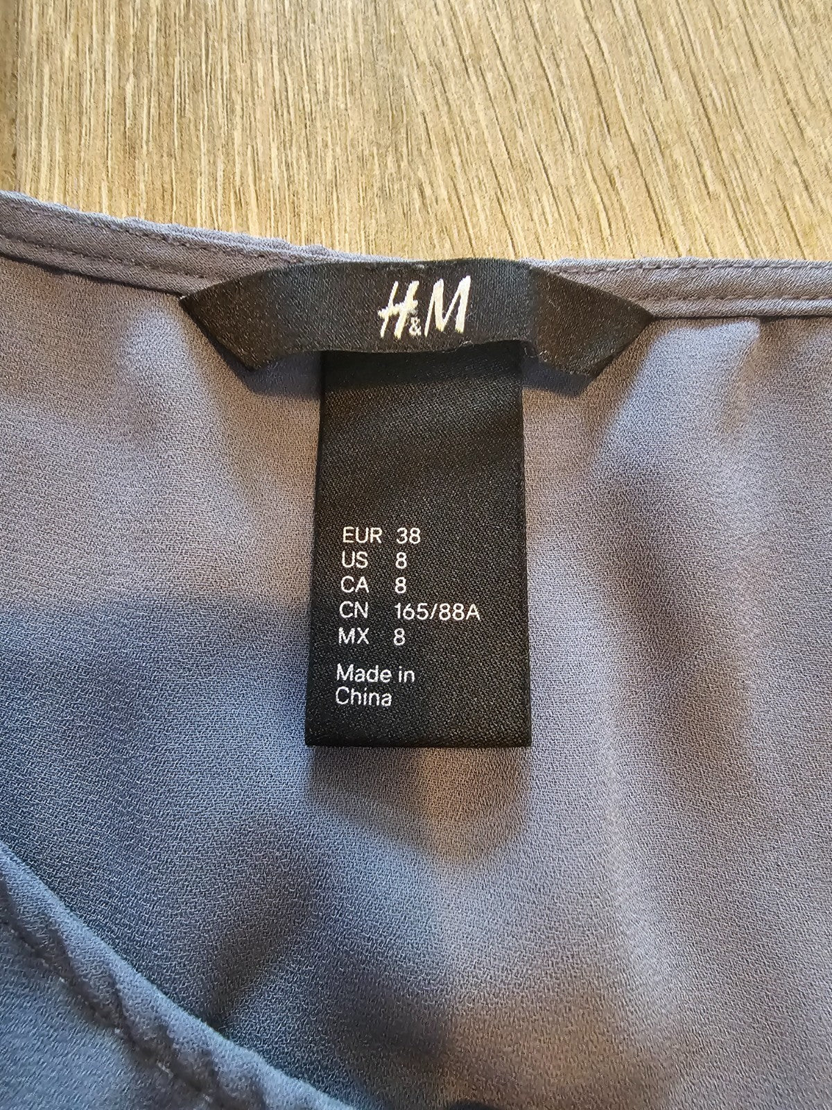 H&M Women’s Sleeveless Tunic Top – Gray – Size 8 (US) – High-Low Hem