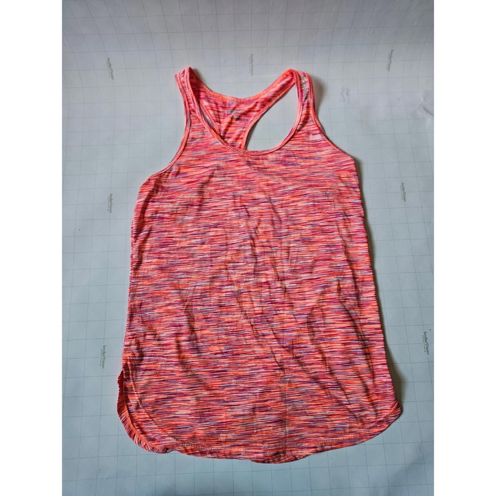 Reebok Women's Pink Activewear Tank Top - Ready to Sweat in Style!